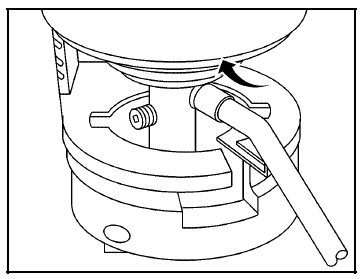4. Turn the sealant canister (B) so the inflator filling