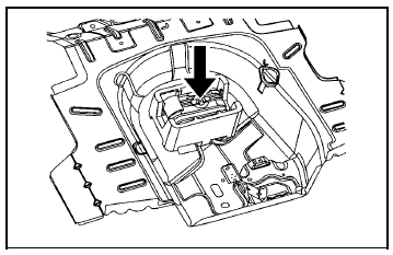 3. Remove the retainer that holds the tire sealant and