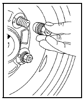 9. Raise the vehicle by turning the jack handle