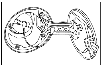 The tethered fuel cap is located behind a hinged fuel